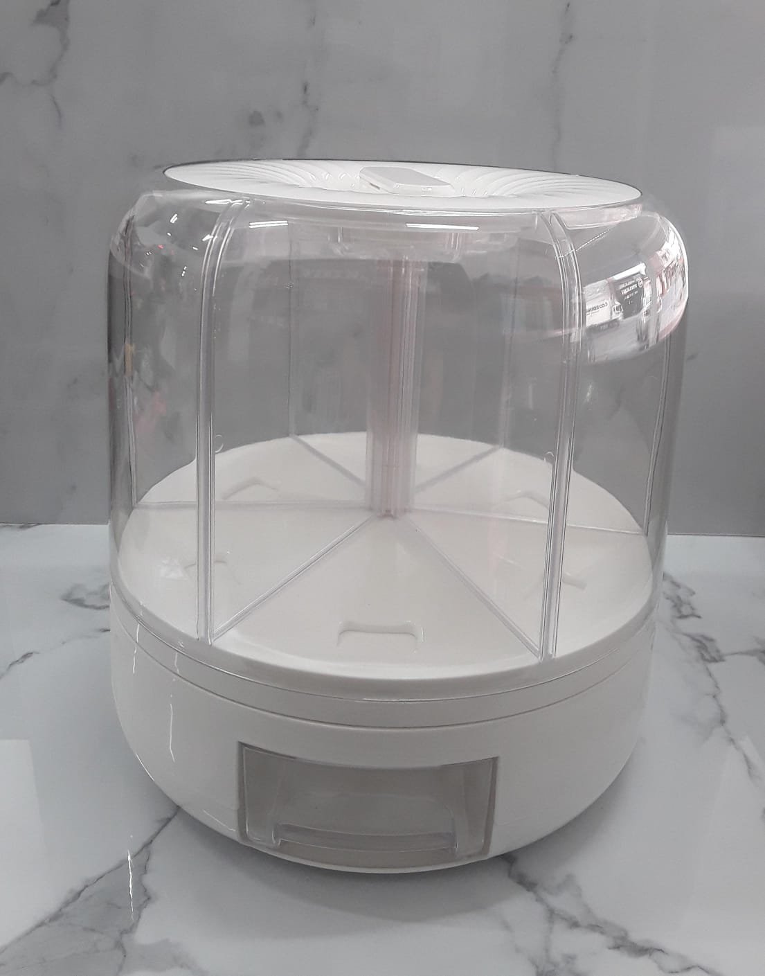 Dispensador De Granos Giratorio.