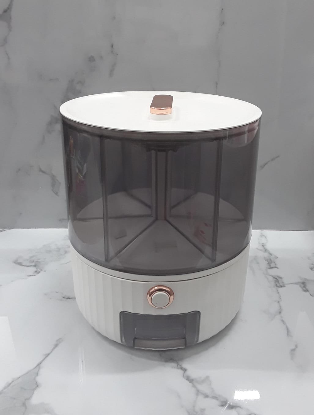 Dispensador De Granos Giratorio.